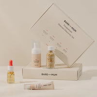 Bare Mum Postpartum Care discovery set with products and packaging on a neutral background