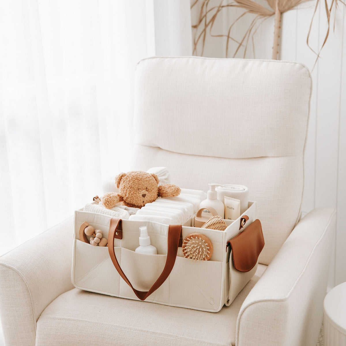 Bunnie Caddie Nappy Caddy on Rocking Chair filled with baby essentials