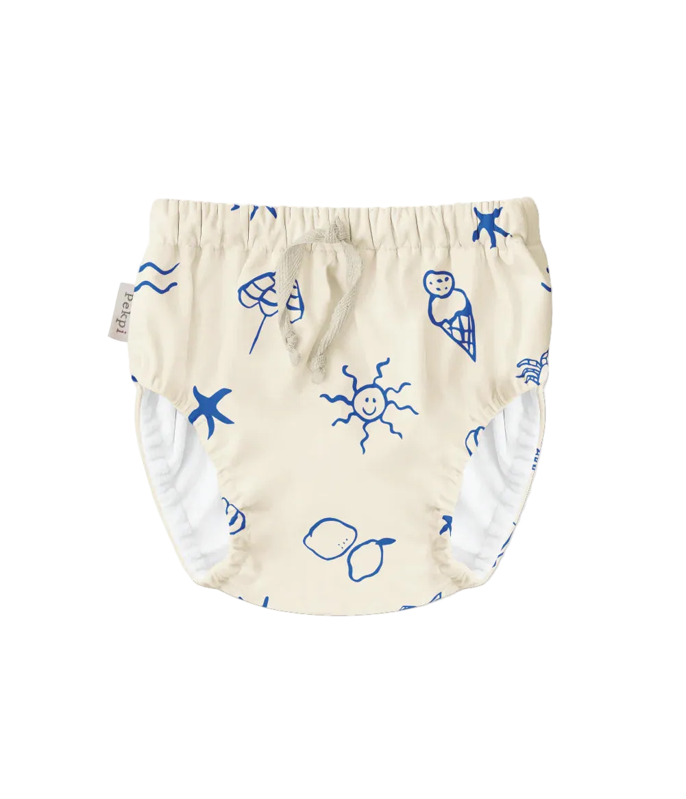 White reusable swim nappy with blue ocean-themed illustrations