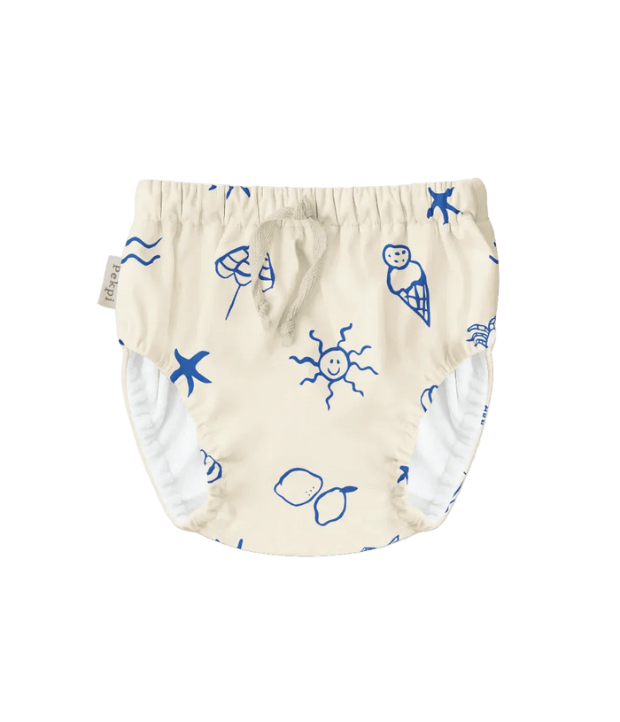 White reusable swim nappy with blue ocean-themed illustrations