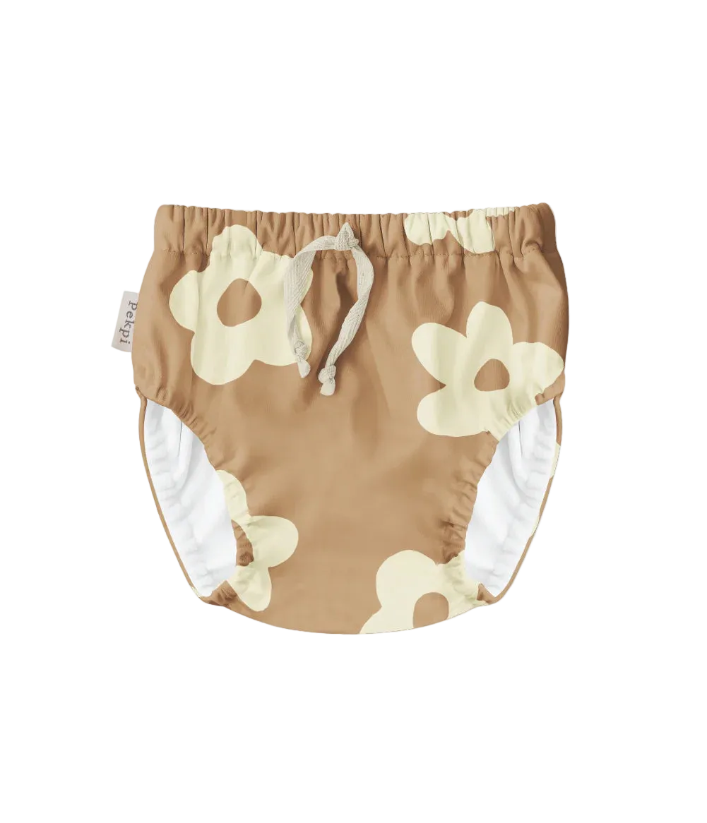Brown reusable swim nappy with white floral pattern by Pekpi